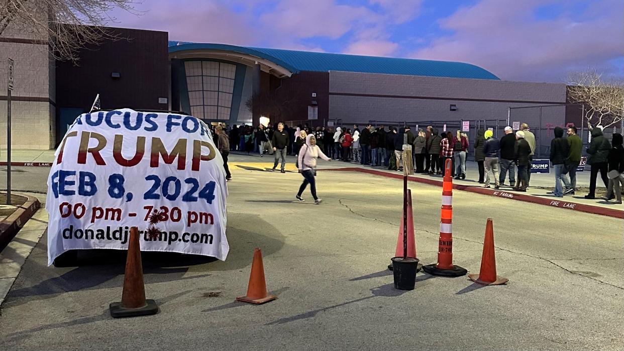 Republican voters wait in line to enter a GOP presidential caucus site at Lois & Jerry Tarkaninan Middle School in Las Vegas, Nevada, on Feb. 8, 2024